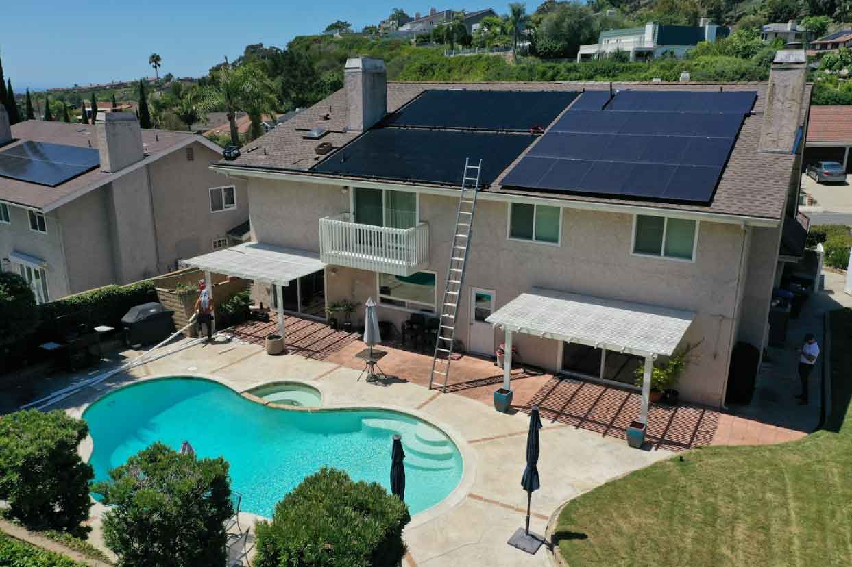 Solar panels being installed on a roof