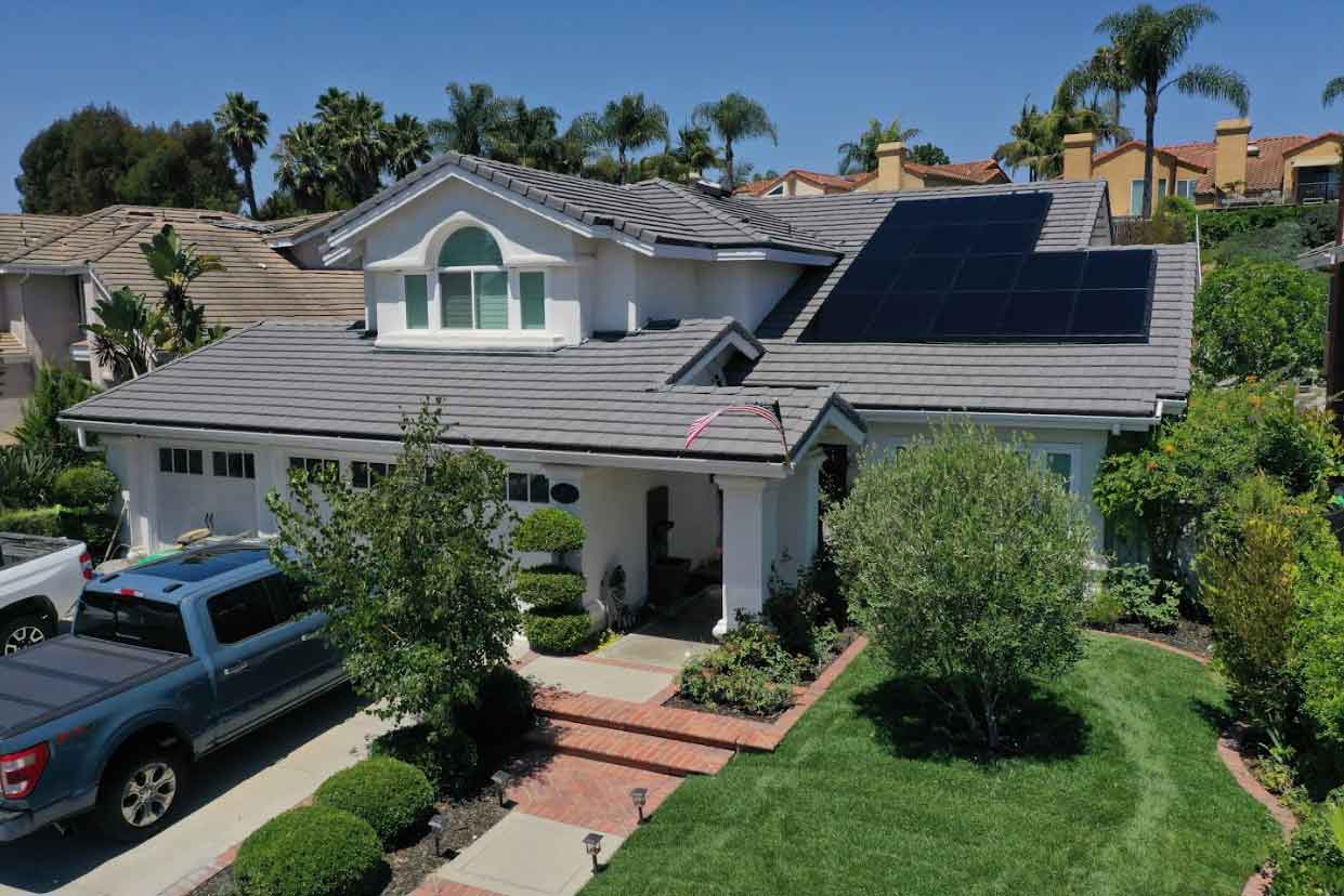 Exterior of a modern home with a solar energy system installed