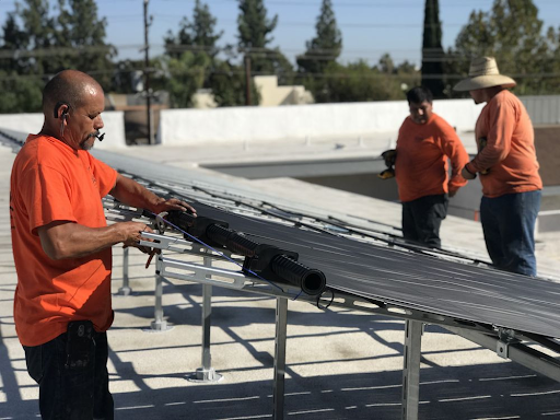 Suntrek Solar technicians repairing Solar Water Heater Panels